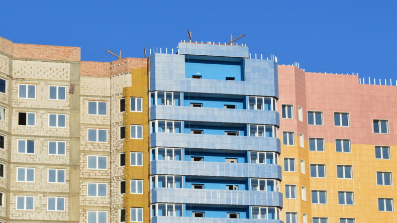 Imagen de una promoción de casas de obra nueva que se deberán declarar cuando se compren