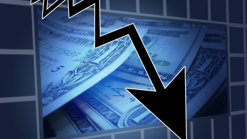 Imagen de dinero haciendo referencia a la inflación y deflación en el sector inmobiliario