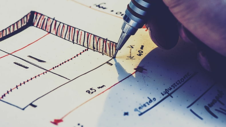 Imagen de un plano que hace referencia a su importancia en una construcción de obra nueva